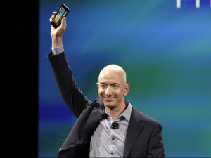 Amazon CEO Jeff Bezos holds the Fire Phone